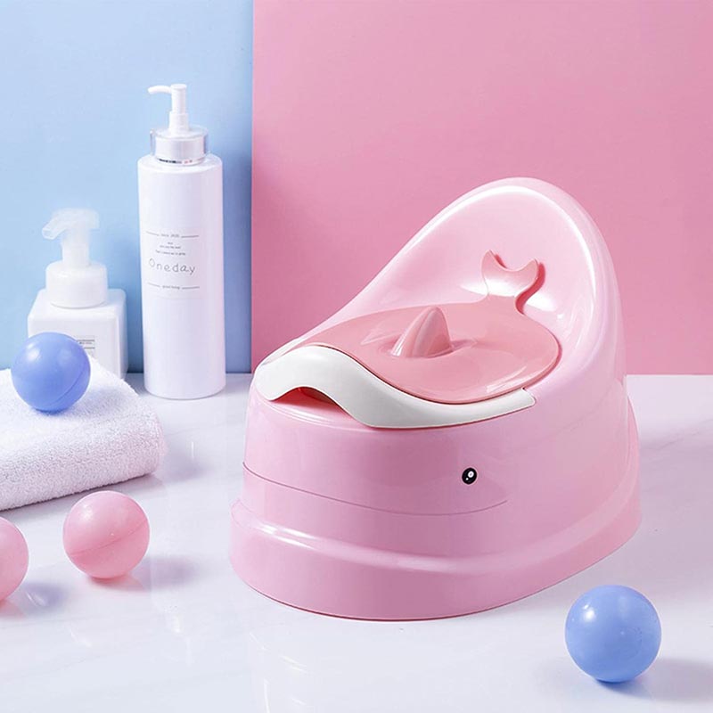Pink EasyClean Potty for kids, featuring a cute whale design and a removable cover. 