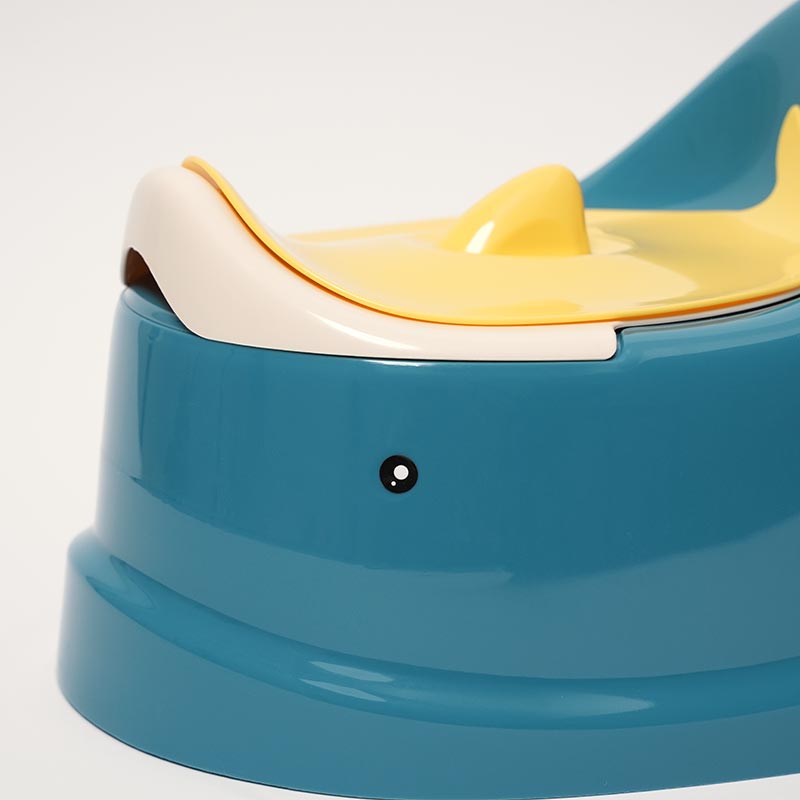 Close up on the whale-shaped potty for children. 