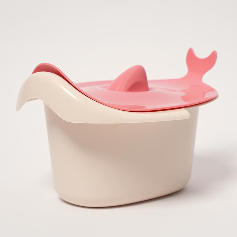 Chamber pot and the lid of the Loondie Easy Clean Potty for kids. 