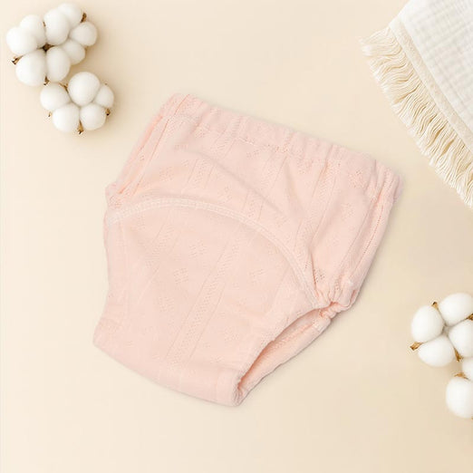 Kid in a disposable training underwear