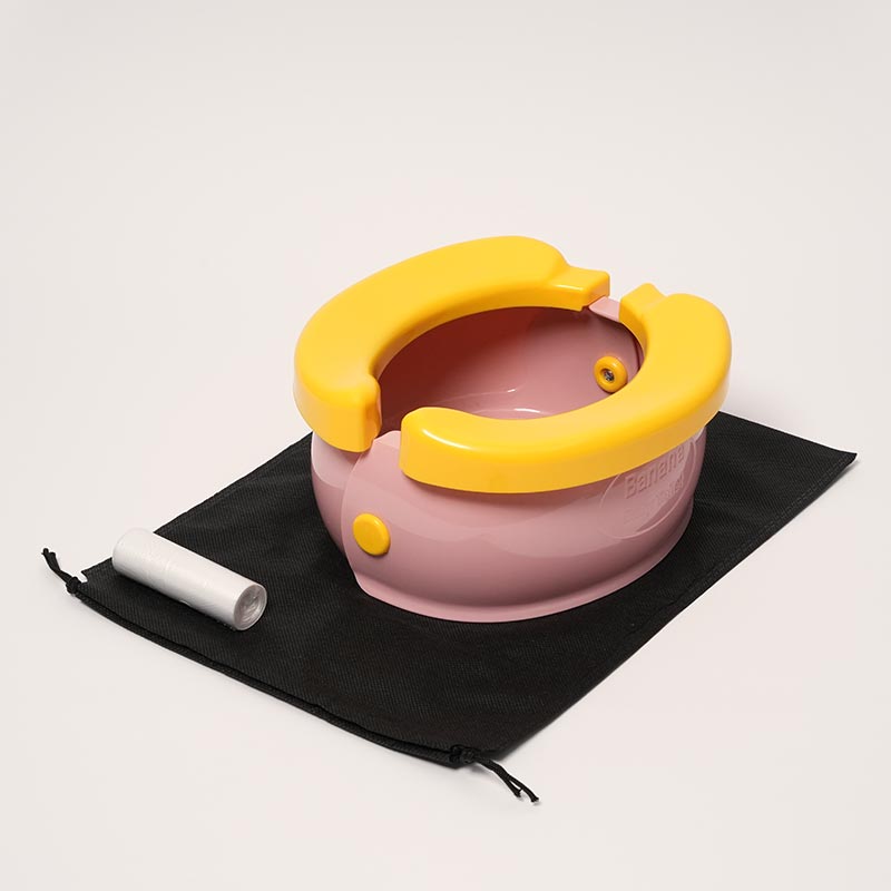 Loondie GoPotty set, including a foldable pink potty, disposable bags, and a storage bag.