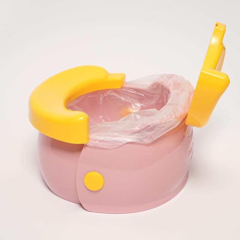 Pink portable and foldable potty for children. 