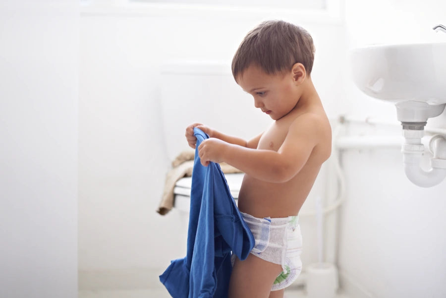 Kid in a disposable training underwear
