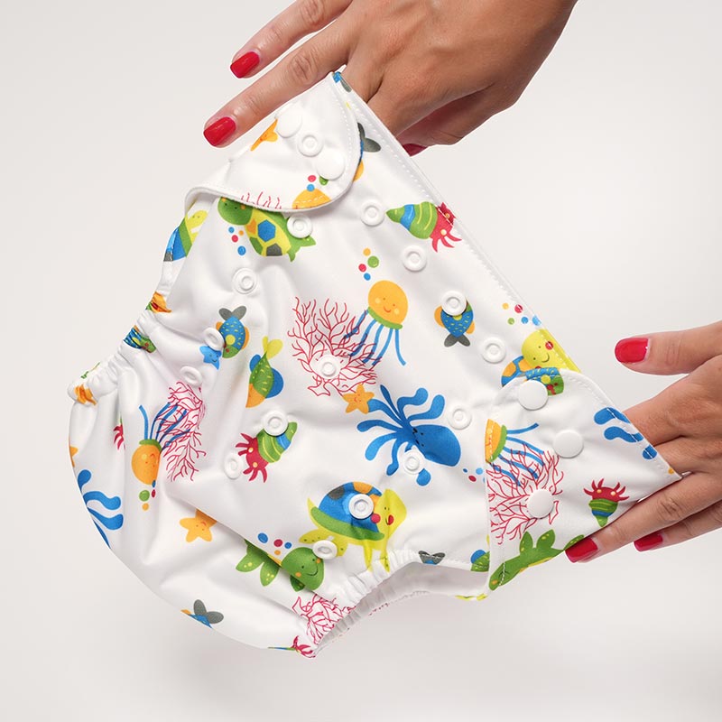 Woman's hands stretching the Loondie Protect+ Undies showing their durability.