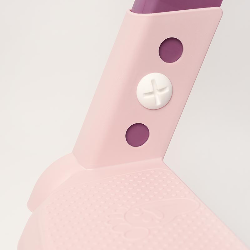 Close up on a screw that regulates height on the Loondie Step Up potty training Seat. 