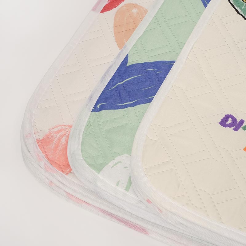 Close up on the reinforced round corners of the Waterproof Dream Mat.