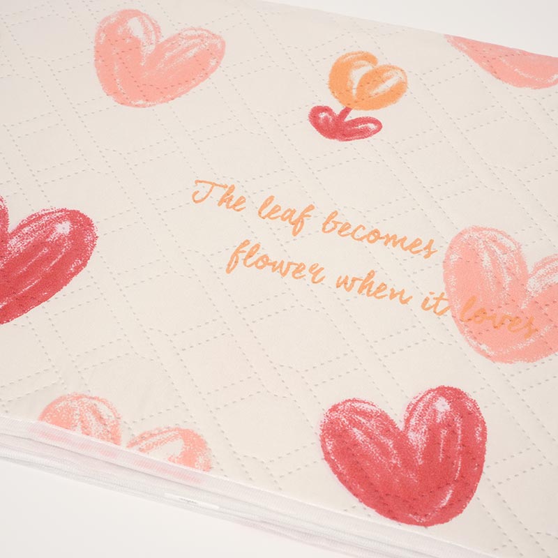 Close up on the absorbent overnight bed mat. 